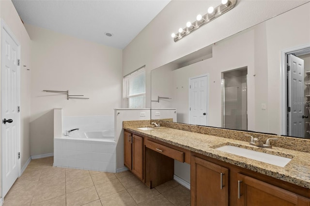 1532 Nightfall Dr, Clermont, FL 34711 - full bathroom with double vanity, a shower stall, a garden tub, and tile patterned floors