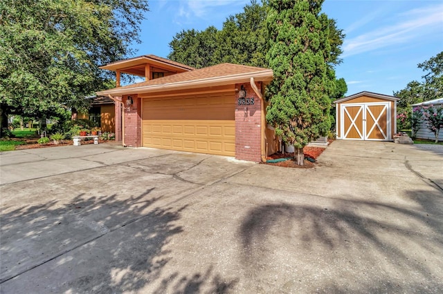 9835 Lakeshore Dr, Clermont, FL 34711 - garage with a shed and driveway