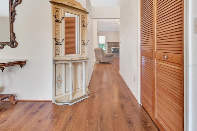 9835 Lakeshore Dr, Clermont, FL 34711 - corridor with wood finished floors and baseboards
