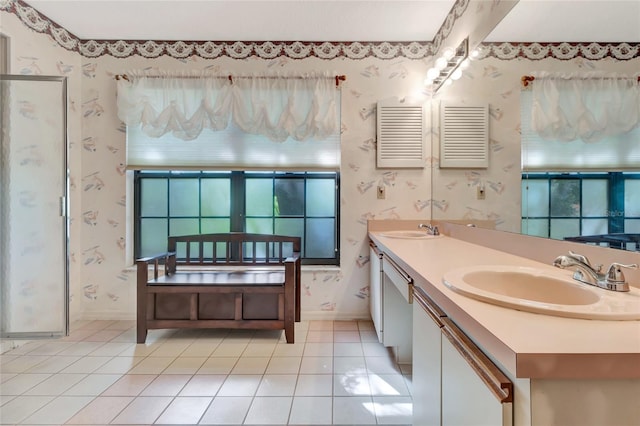 9835 Lakeshore Dr, Clermont, FL 34711 - full bathroom with wallpapered walls, tile patterned floors, plenty of natural light, and double vanity