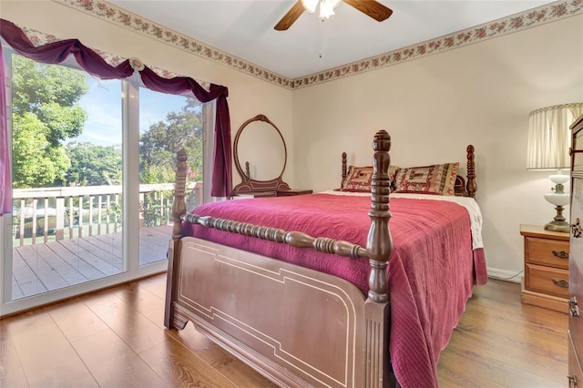 9835 Lakeshore Dr, Clermont, FL 34711 - bedroom featuring access to outside, wood finished floors, and ceiling fan