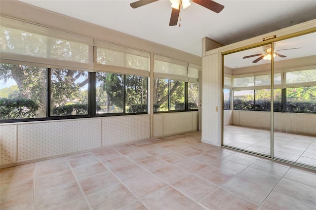 9835 Lakeshore Dr, Clermont, FL 34711 - unfurnished sunroom with a ceiling fan and plenty of natural light