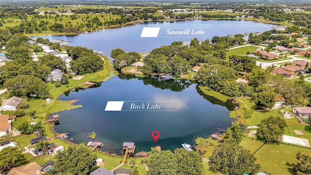 9835 Lakeshore Dr, Clermont, FL 34711 - aerial perspective of suburban area with a large body of water