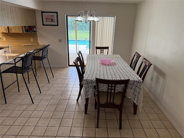 2747 County Road 615, Bushnell, FL 33513 - dining room with light tile patterned flooring and a chandelier