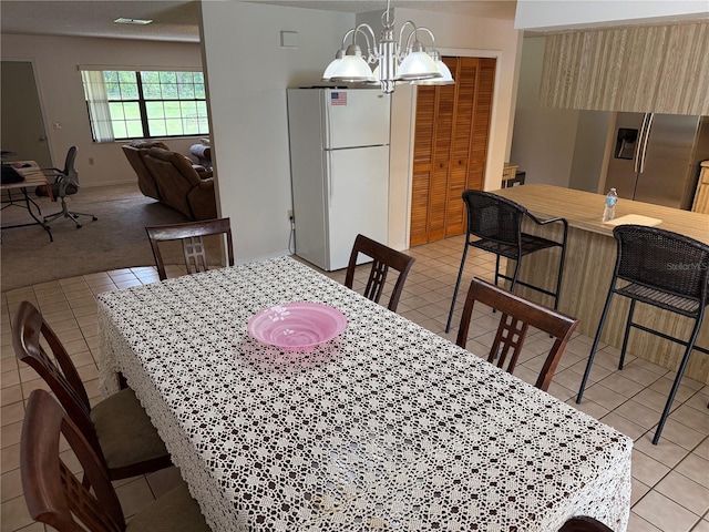 2747 County Road 615, Bushnell, FL 33513 - dining room with light tile patterned flooring and a chandelier