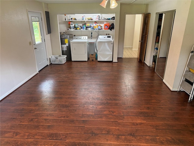 2747 County Road 615, Bushnell, FL 33513 - washroom featuring washing machine and dryer, electric water heater, and dark wood-style flooring