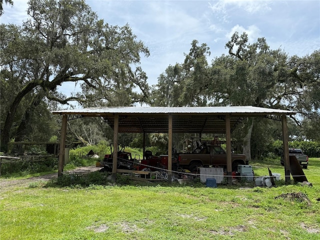 2747 County Road 615, Bushnell, FL 33513 - view of green lawn featuring a carport