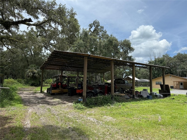 2747 County Road 615, Bushnell, FL 33513 - view of parking / parking lot with a detached carport
