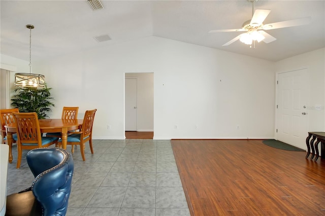 17707 SE 92nd Grantham Ter, The Villages, FL 32162 - dining room featuring vaulted ceiling, ceiling fan, and wood finished floors