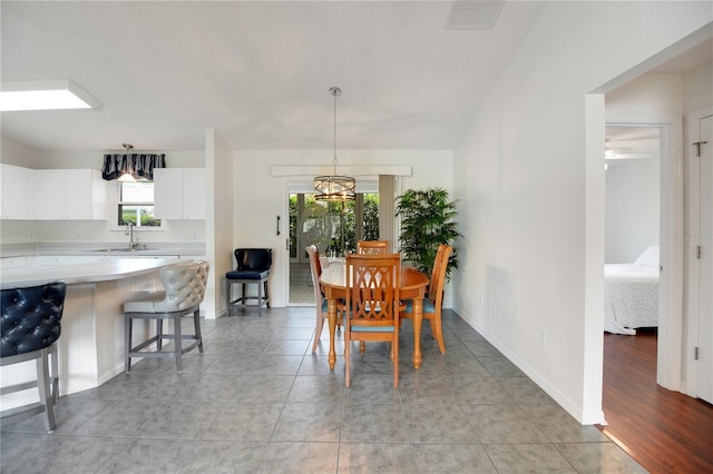 17707 SE 92nd Grantham Ter, The Villages, FL 32162 - dining space featuring baseboards and light tile patterned floors