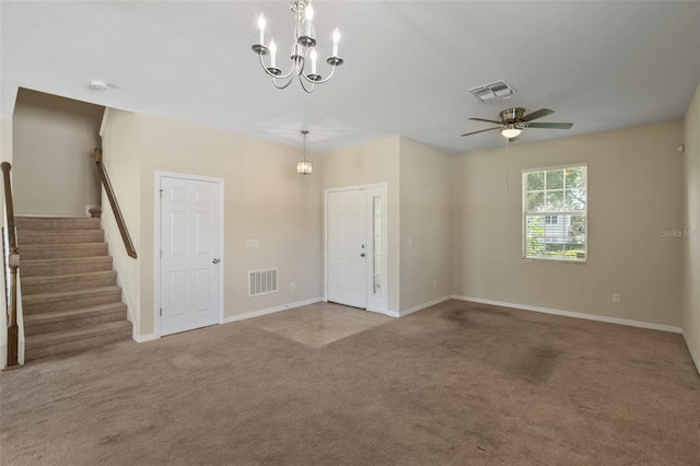 2215 Natoma Blvd, Mount Dora, FL 32757 - spare room with carpet flooring, a chandelier, stairs, and a ceiling fan