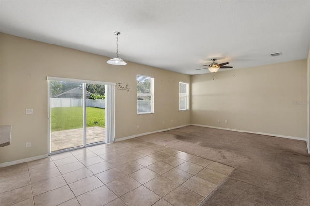 2215 Natoma Blvd, Mount Dora, FL 32757 - spare room with a ceiling fan and light tile patterned floors