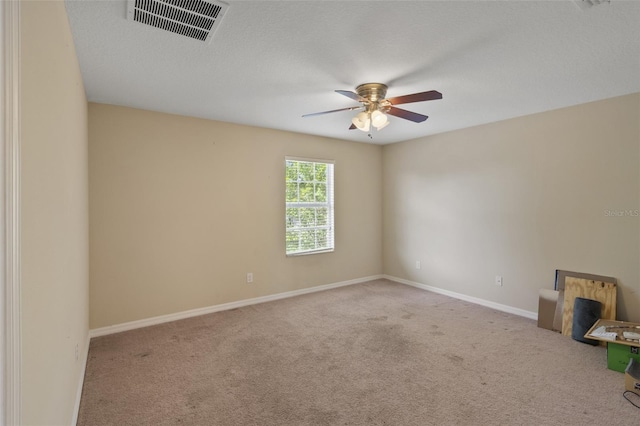 2215 Natoma Blvd, Mount Dora, FL 32757 - carpeted empty room featuring a ceiling fan and baseboards