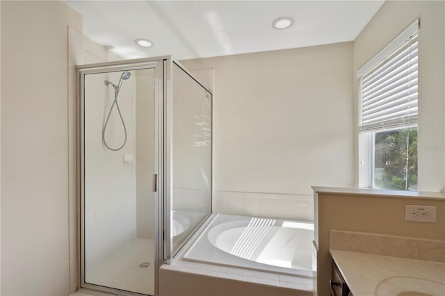 2215 Natoma Blvd, Mount Dora, FL 32757 - bathroom with a stall shower, a garden tub, vanity, and recessed lighting