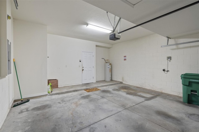 2215 Natoma Blvd, Mount Dora, FL 32757 - garage featuring electric water heater, a garage door opener, concrete block wall, and electric panel