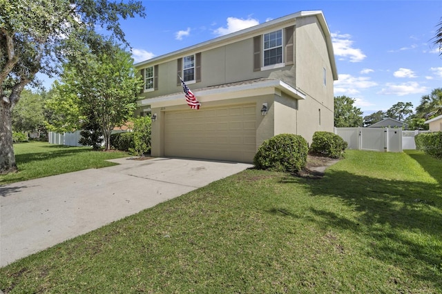 2215 Natoma Blvd, Mount Dora, FL 32757 - traditional home with stucco siding, an attached garage, driveway, and a gate