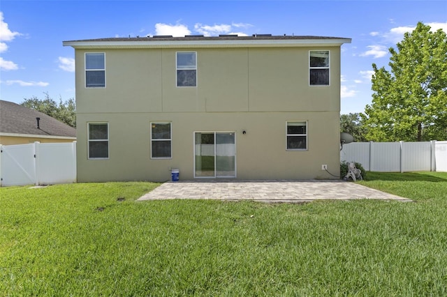 2215 Natoma Blvd, Mount Dora, FL 32757 - rear view of house with a patio, a fenced backyard, and stucco siding