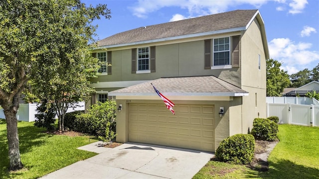 2215 Natoma Blvd, Mount Dora, FL 32757 - traditional home featuring a shingled roof, driveway, an attached garage, and stucco siding