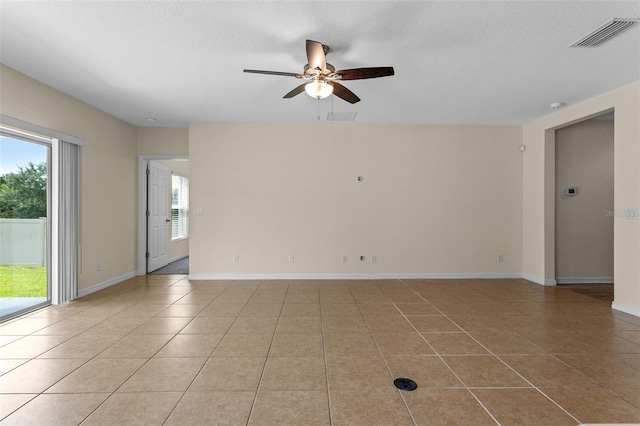1504 Finchburg St, Minneola, FL 34715 - spare room featuring a ceiling fan, tile patterned flooring, and a textured ceiling