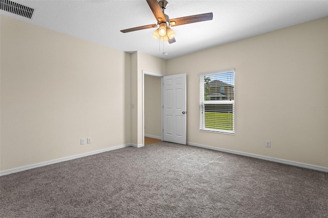 1504 Finchburg St, Minneola, FL 34715 - empty room with carpet flooring and ceiling fan