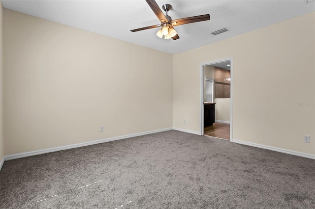 1504 Finchburg St, Minneola, FL 34715 - unfurnished bedroom with carpet floors, a ceiling fan, and ensuite bathroom