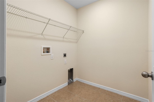 1504 Finchburg St, Minneola, FL 34715 - laundry area featuring washer hookup, hookup for an electric dryer, and light tile patterned flooring