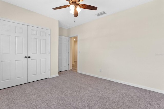 1504 Finchburg St, Minneola, FL 34715 - unfurnished bedroom featuring carpet flooring, a closet, and ceiling fan