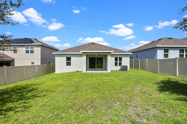 1504 Finchburg St, Minneola, FL 34715 - back of house with a fenced backyard, stucco siding, and ceiling fan