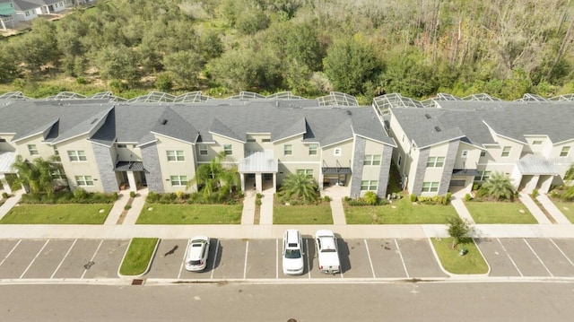 8971 Cabot Cliffs Dr, Davenport, FL 33896 - aerial perspective of suburban area with a forest
