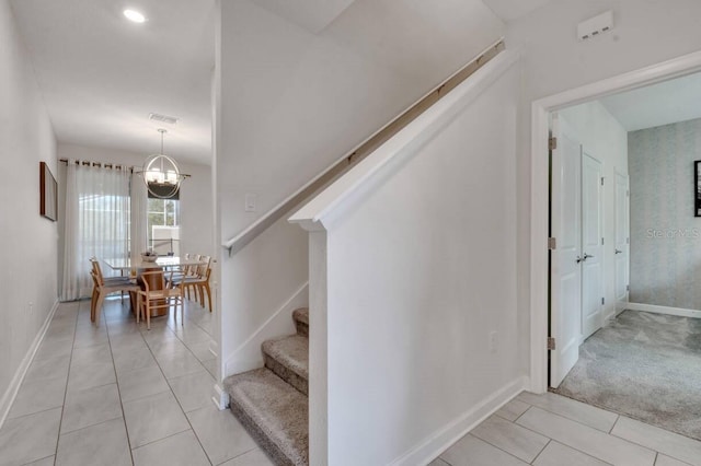 8971 Cabot Cliffs Dr, Davenport, FL 33896 - stairs with baseboards and tile patterned floors