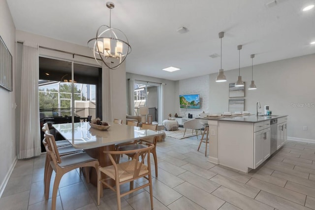 8971 Cabot Cliffs Dr, Davenport, FL 33896 - dining space featuring baseboards and a chandelier
