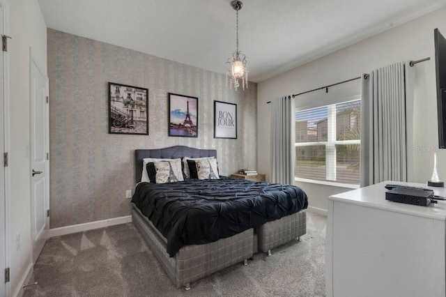 8971 Cabot Cliffs Dr, Davenport, FL 33896 - bedroom featuring wallpapered walls and carpet