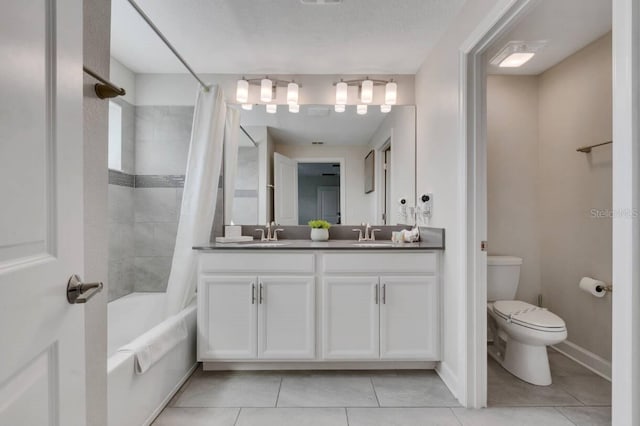 8971 Cabot Cliffs Dr, Davenport, FL 33896 - bathroom featuring double vanity, tile patterned flooring, and shower / tub combo with curtain