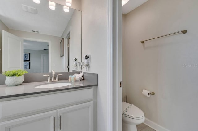 8971 Cabot Cliffs Dr, Davenport, FL 33896 - bathroom with vanity and tile patterned flooring