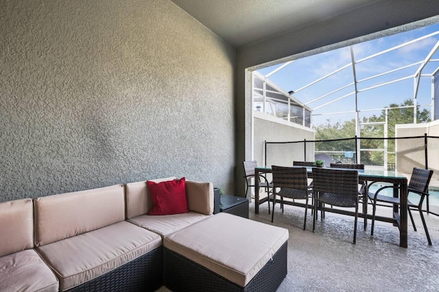 8971 Cabot Cliffs Dr, Davenport, FL 33896 - sunroom with vaulted ceiling, an outdoor hangout area, and outdoor dining space