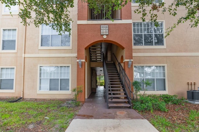 5518 Metrowest Blvd Unit 11-302, Orlando, FL 32811 - entrance to property with stucco siding