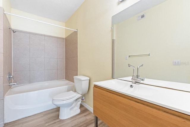 5518 Metrowest Blvd Unit 11-302, Orlando, FL 32811 - full bathroom featuring vanity, shower / washtub combination, and wood finished floors