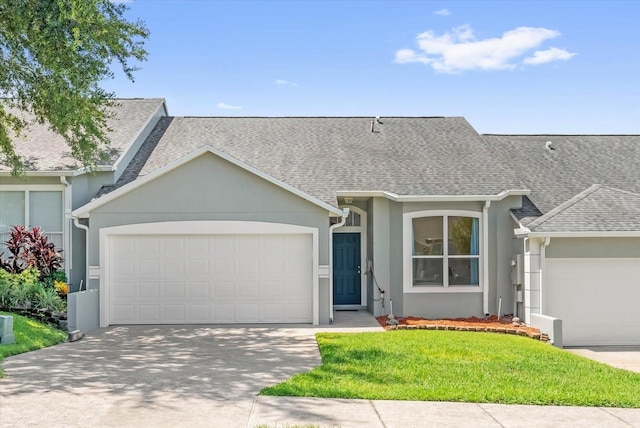 637 Harbor Villa Ct, Clermont, FL 34711 - ranch-style house with a garage, a shingled roof, concrete driveway, stucco siding, and a front yard