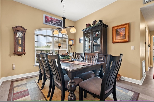 406 Benjamin Ct, Fruitland Park, FL 34731 - dining space with wood finished floors and a chandelier
