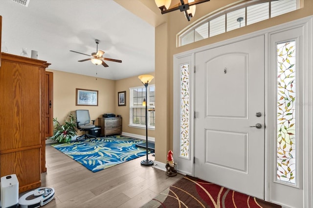 406 Benjamin Ct, Fruitland Park, FL 34731 - foyer entrance with ceiling fan and wood finished floors