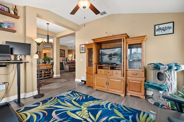 406 Benjamin Ct, Fruitland Park, FL 34731 - living room with ceiling fan, wood finished floors, and lofted ceiling