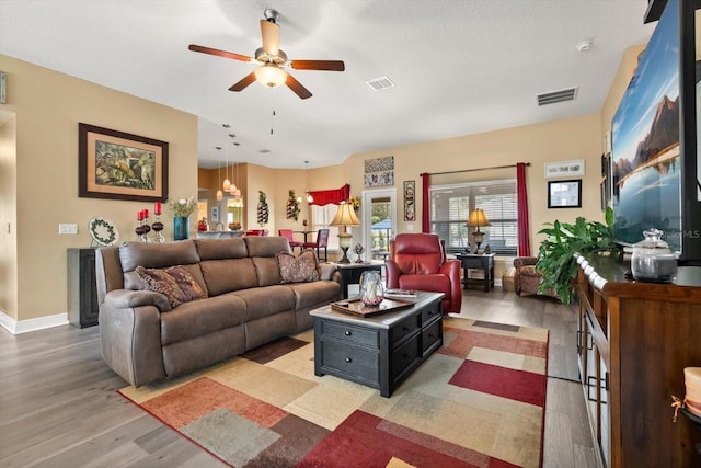 406 Benjamin Ct, Fruitland Park, FL 34731 - living room with ceiling fan and light wood-style floors