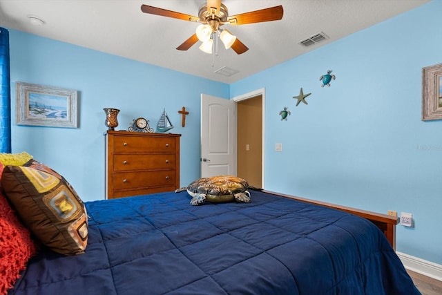 406 Benjamin Ct, Fruitland Park, FL 34731 - bedroom with wood finished floors and a ceiling fan