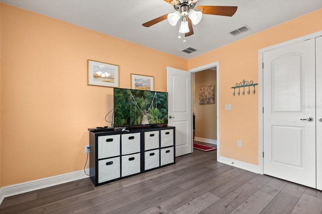 406 Benjamin Ct, Fruitland Park, FL 34731 - unfurnished bedroom with wood finished floors and ceiling fan