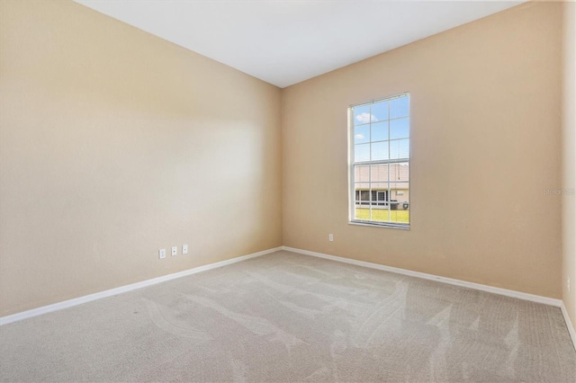 12205 SE 173rd Pl, Summerfield, FL 34491 - carpeted empty room featuring baseboards
