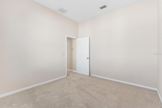 12205 SE 173rd Pl, Summerfield, FL 34491 - unfurnished room featuring light carpet and baseboards