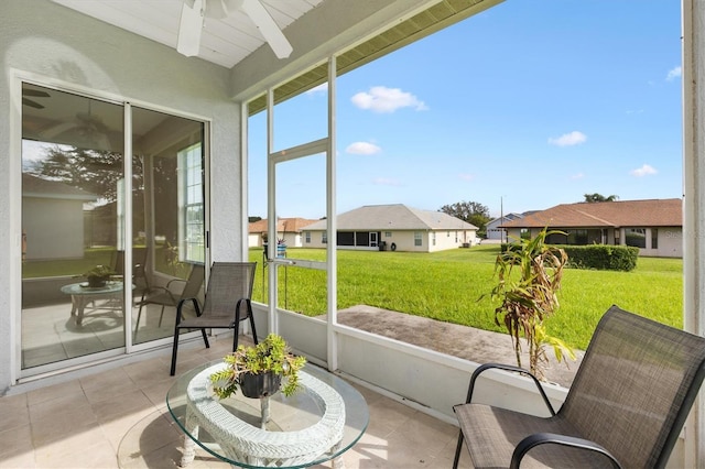 12205 SE 173rd Pl, Summerfield, FL 34491 - sunroom featuring ceiling fan, a residential view, and beamed ceiling