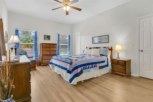 5135 Indian Ocean Loop, Tavares, FL 32778 - bedroom featuring light wood finished floors and a ceiling fan