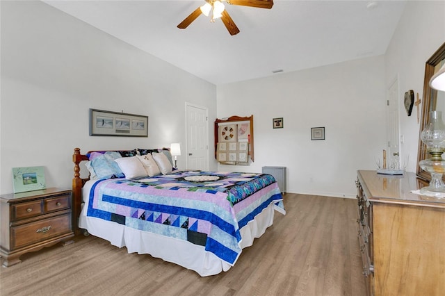 5135 Indian Ocean Loop, Tavares, FL 32778 - bedroom with light wood-type flooring and a ceiling fan