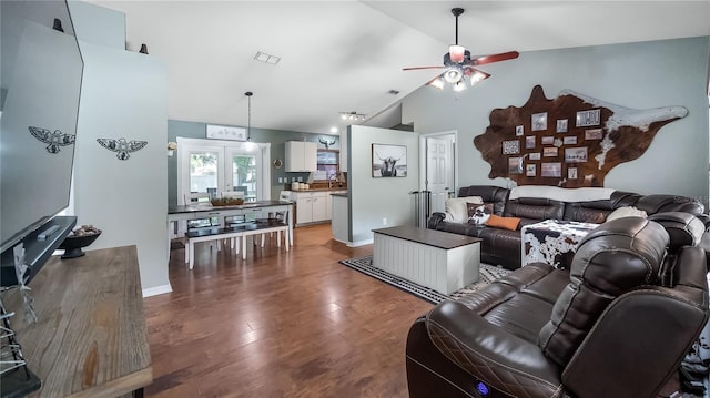 11746 Oswalt Rd, Clermont, FL 34711 - living area featuring a ceiling fan, wood finished floors, and high vaulted ceiling